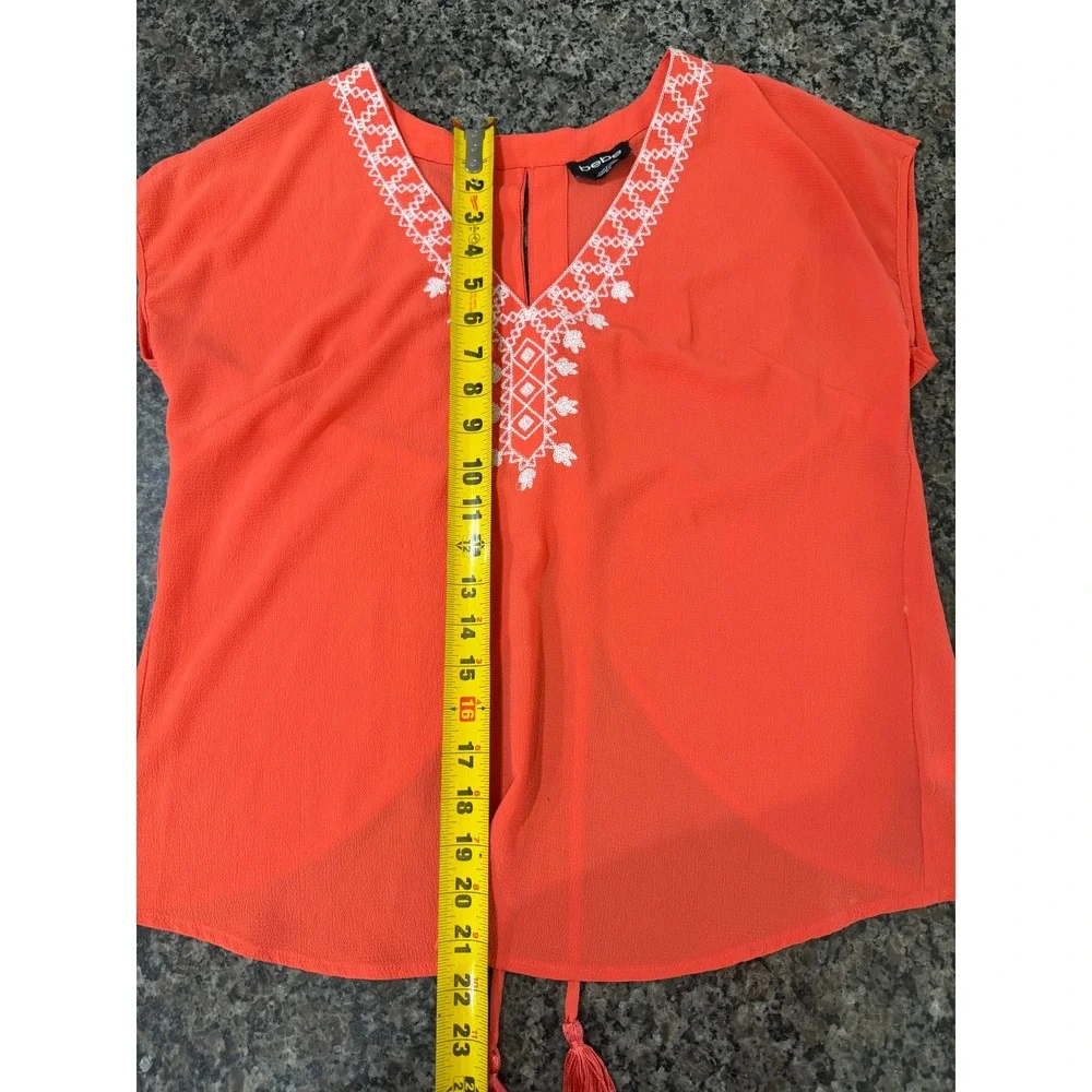 Bebe Womens Coral Orange Embroidered V-Neck Lace Up Back Tassel Blouse Size M